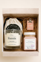 Gift set with candle, bath crystals, and bag in a box